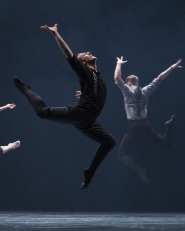 Pacific Northwest Ballet soloist Ezra Thomson w company dancersPhoto © Angela Sterling.