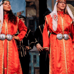 Women dressed in traditional costumes.